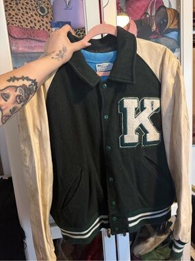 Spirit Black Varsity Jacket with Cream Sleeves